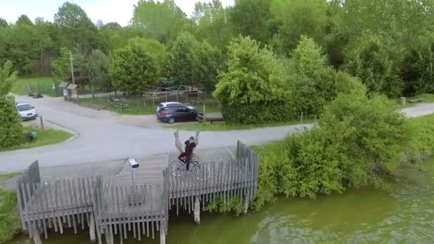 Young Man Sits His Bicycle Drives Away Going Drive River — Stock Video