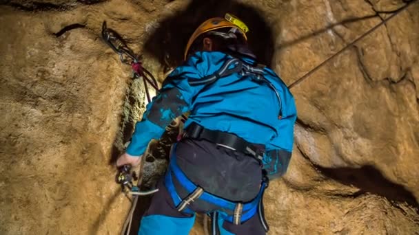 Footage Climber Hanging Rope Dark Cave — Stock Video