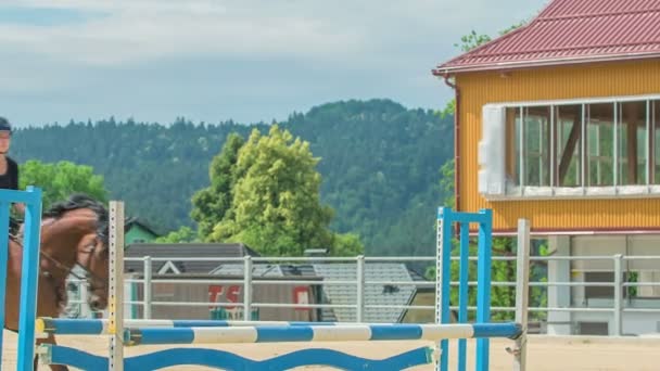 Young Woman Having Riding Session Outdoors She Practising Jumping Barriers — Stock Video