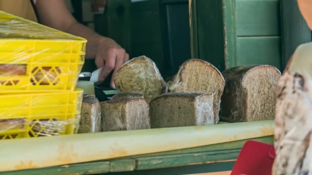 Young Girl Who Selling Bread Bakery Gives Receipt Elderly Woman — 图库视频影像