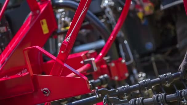 Young Man Taking Out Some Rotary Rakes Out Agricultural Machinery — Stock Video