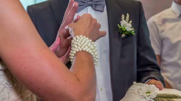 Bride Putting Wedding Ring Her Husband Finger Getting Married — Stock Video