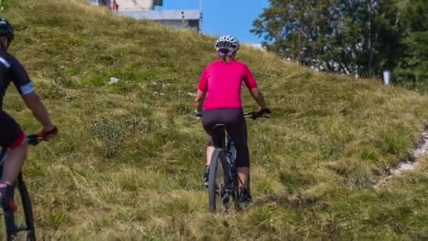 Two Cyclists Riding Bicycles Uphill Tiny Path Very Hot Day — Stock Video