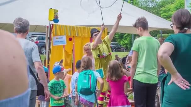 Man Costumes Making Big Soap Bubble Children Having Fun Bursting — Stock Video