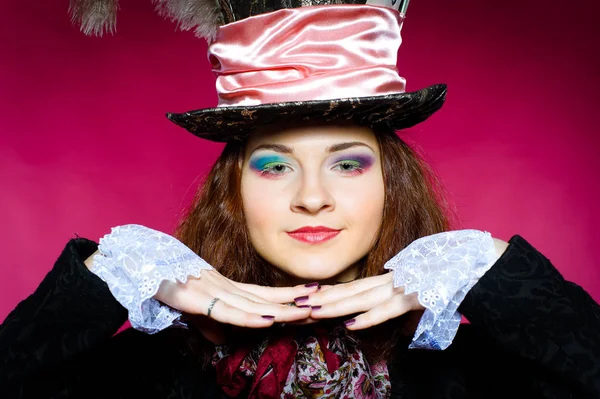Portrait of young woman in the similitude of the Hatter