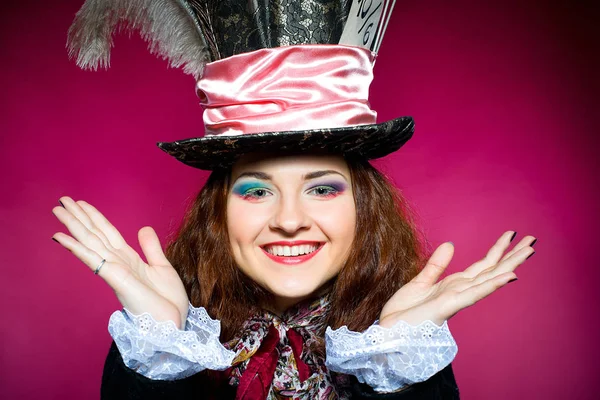 Young woman in the similitude of the Hatter Stock Photo