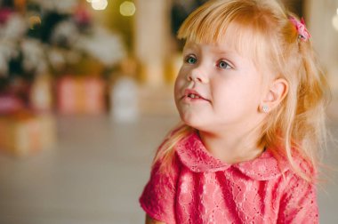 Little girl over background with bokeh