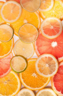 Mosaic of citrus slices with back light