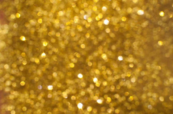 Abstract background with glittering golden bokeh — Stock Photo, Image