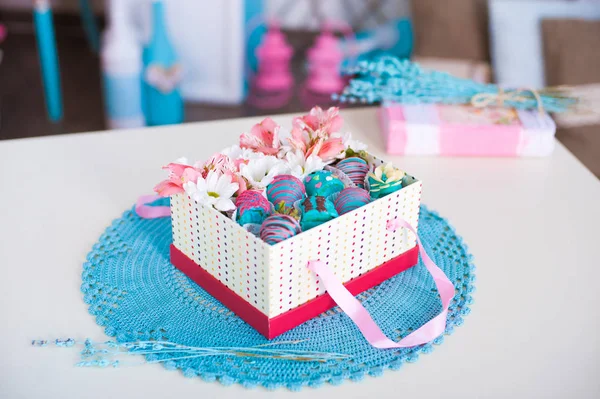 Gift box on the crocheted napkin