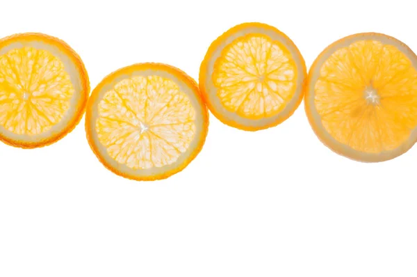 Sliced fresh oranges isolated on white — Fotografia de Stock