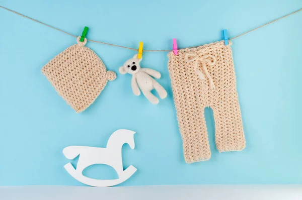 Newborn Baby Hat Pants Clothespins Bear Horse Toys Light Blue — Stock Photo, Image