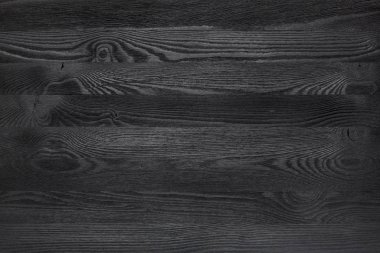 Office öğeleri ile siyah ahşap masa