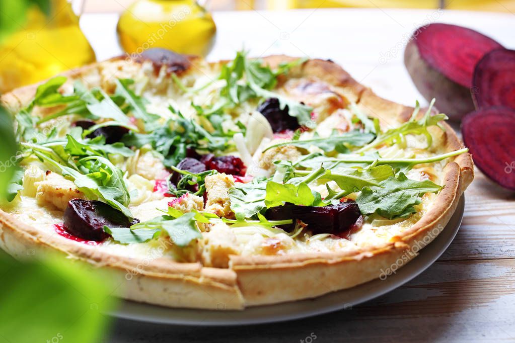 Pizza with mozzarella and beetroot. Vegetarian pizza.