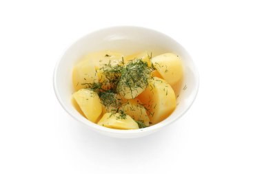 Dereotuile patates. Beyaz arka plana karşı yemek için malzemeler