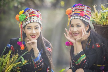 Beautiful Laos Women wearing Laos traditional dress costume,Asian girl wearing traditional Laos culture,vintage style,traditional of Laos suit. clipart