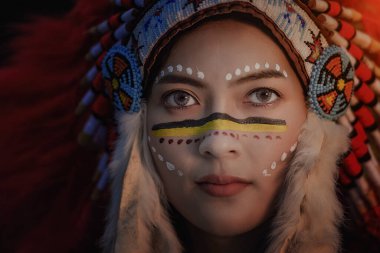 Amerikan Yerli Kadın Avcısı, Amerikan Yerlisi