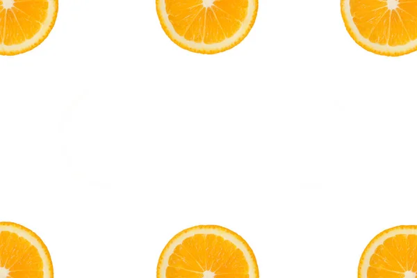 Оранжевый или лимонный рисунок в углах на белом изолированном фоне . — стоковое фото