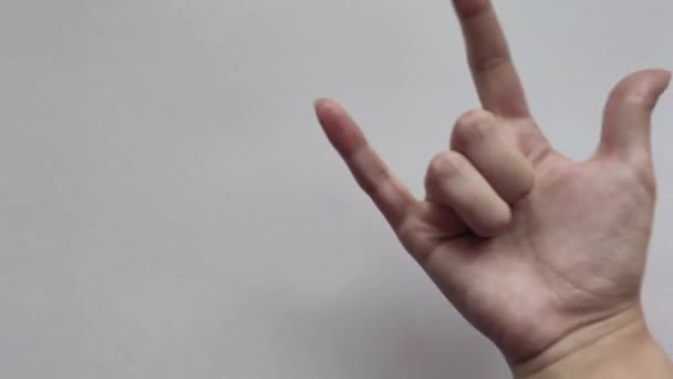 White Girl Shows Right Hand Sign Goat White Background — Stock Video