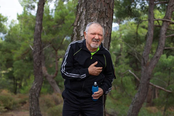 Elderly Active Man Faces Health Problems Heart Attack Jogging Sport — Stock Photo, Image