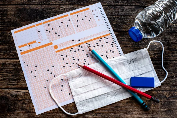 Koronavirüs yüzünden maskeyle yapılan birçok test. Tumefl, lgs, tuss, osym, ygs, yks gibi sınavlar