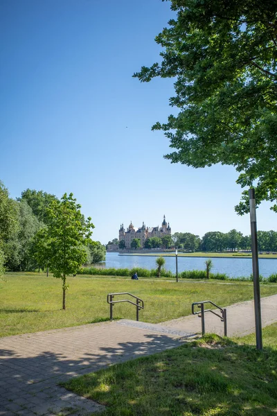 the Schwerin castle and the sky is cloudless and blue