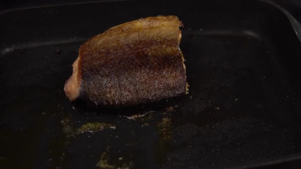 Slice of red fish fried in deep pan. — Stock Footage Slice of red fish fried in deep pan. Video Clip