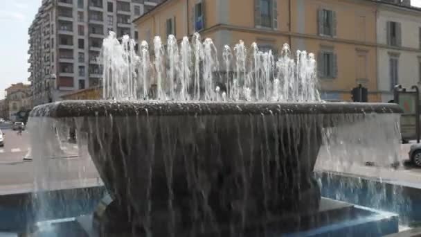 Mortara, Italy – circa May 2016: Cars passing by the station fountain, — Stock Video
