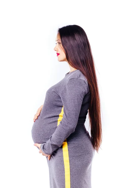 Gravid ung kvinna väntar på sitt barn. — Stockfoto