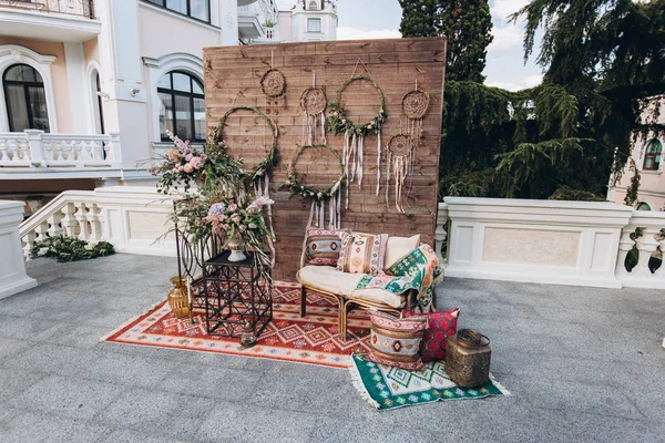 Decorated photo zone in the style of boho.