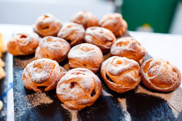 Coffee muffins on the buffet table at the event. Fresh cakes.