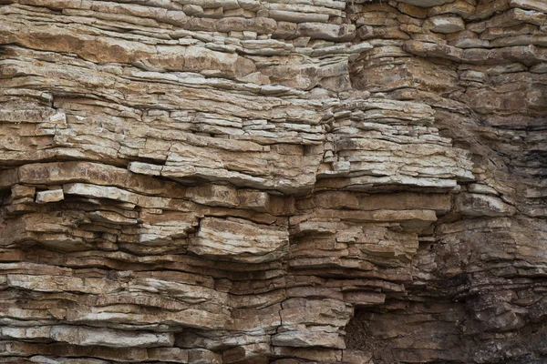 土壌カット砂岩、石、粘土、砂の構造と層。異なる構造の層を持つ砂のスライス. — ストック写真