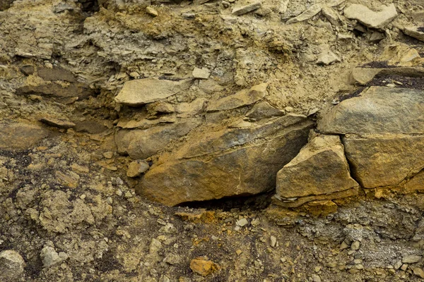 Κόψιμο χώματος-ψαμμίτης, πέτρες, πηλός, δομή άμμου και στρώματα. φέτα άμμου με στρώματα διαφορετικών δομών. — Φωτογραφία Αρχείου