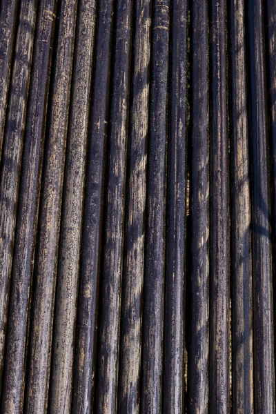 Oil Drill pipe. Rusty drill pipes were drilled in the well section. Downhole drilling rig. Laying the pipe on the deck. View of the shell of drill pipes laid in courtyard of the oil and gas warehouse. — Stock Photo, Image