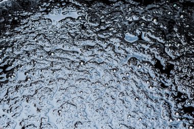 ham petrol yüzeyi dokusu. Petrol ürünleriyle kirlilik.