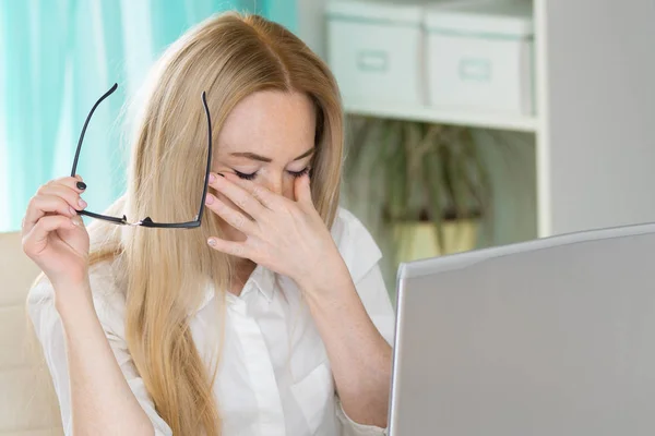 Tired young woman student feeling eye strain bad blurry vision rubbing dry irritated eyes taking off glasses after computer work, fatigued teen girl suffer from discomfort tension problem concept. — Stock Photo, Image