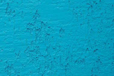 Mavi beton duvar, pürüzlü yüzey mavi kum gibi görünüyor. Arka plan desen tasarımı. Eski açık mavi çimento dokusu ve arkaplanı.