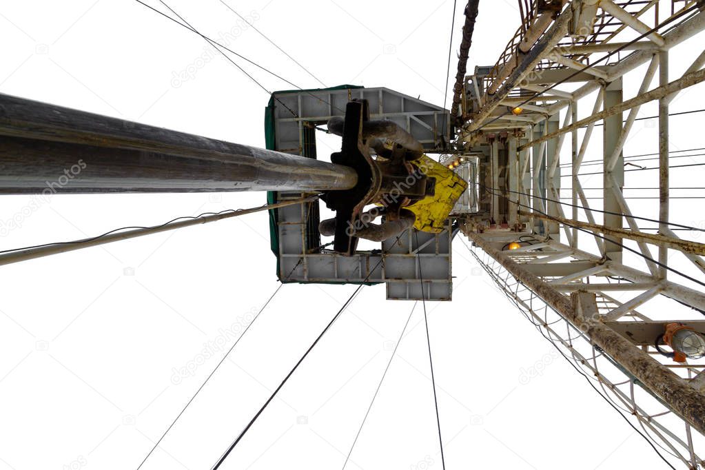 Oil and Gas Drilling Rig. Oil platform isolated on white background. Drilling rig in oil field for drilled into subsurface in order to produced crude, inside view. Petroleum Industry.