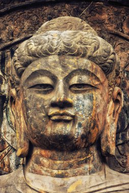 Luoyang, Hernan, Çin-Aralık 25,2017: Longmen mağarasını Luoyang, Çin heykelinin Budist yakın çekim