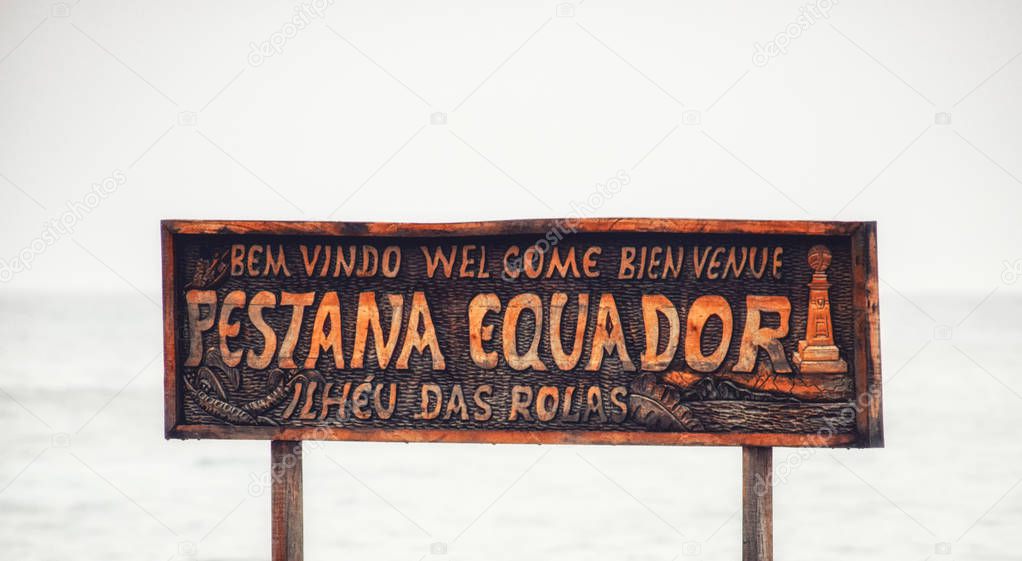 rolas island sign on the wharf at Island Rolas Sao Tome and Principe