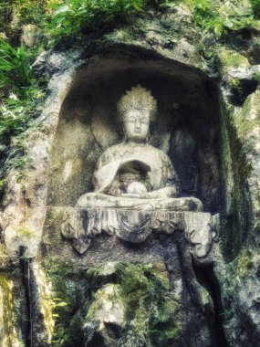 Feilai Feng mağarasını iyi Budist taş oymalar ile. Bunun adı ' buraya uçtu tepe 