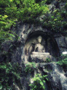 Feilai Feng mağarasını iyi Budist taş oymalar ile. Bunun adı ' buraya uçtu tepe 