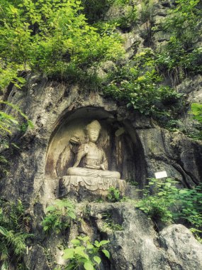 Feilai Feng mağarasını iyi Budist taş oymalar ile. Bunun adı ' buraya uçtu tepe 