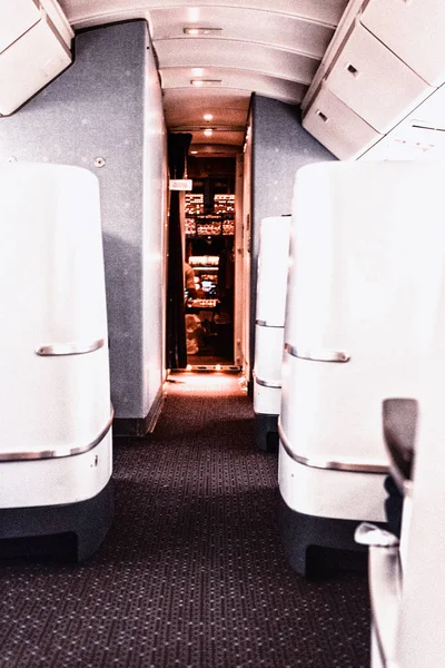 Airplane interior detail with a view to the pilot's cabin — Stock Photo, Image