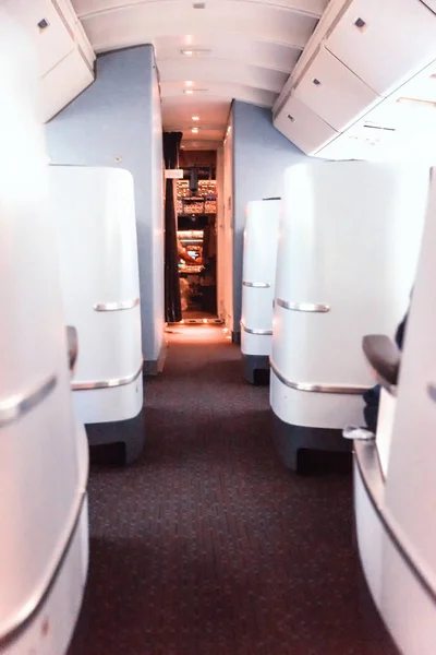 Airplane interior detail with a view to the pilot's cabin — Stock Photo, Image