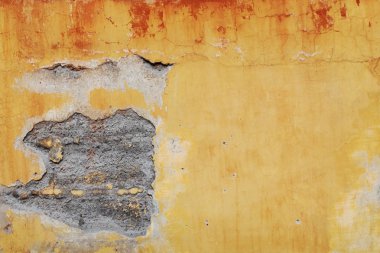 Çatlak eski sarı duvar dokusu