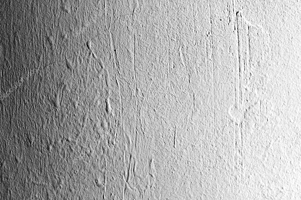 Old white surface background. White texture with scratches and cracks. Distressed grunge texture background. 