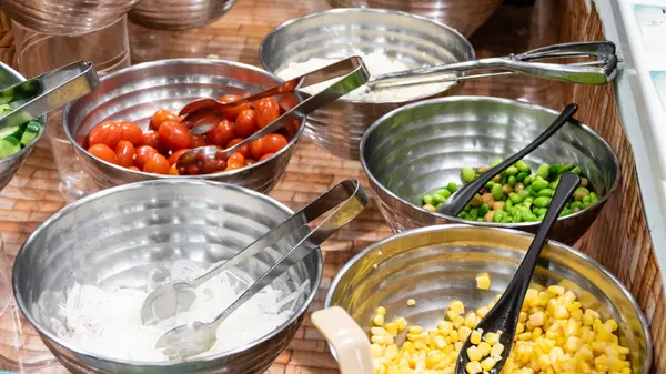 Vegetables in bowls at buffet — Stock Photo, Image