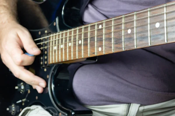 Close-up of man playing lead guitar solo — Stock Photo, Image