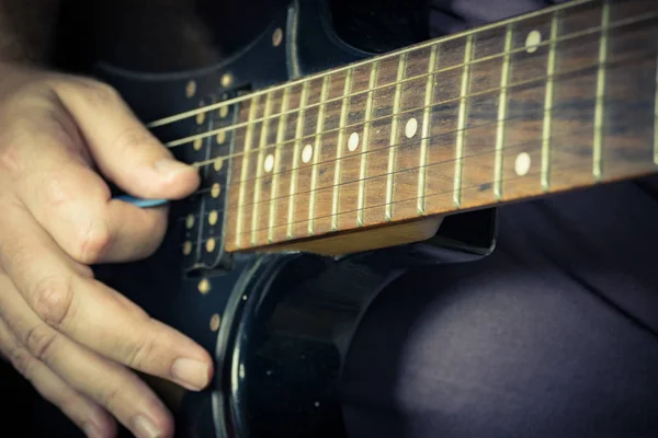 Close-up of man playing lead guitar solo — Stock Photo, Image